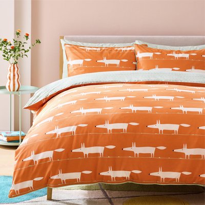Orange mr fox print bedding.